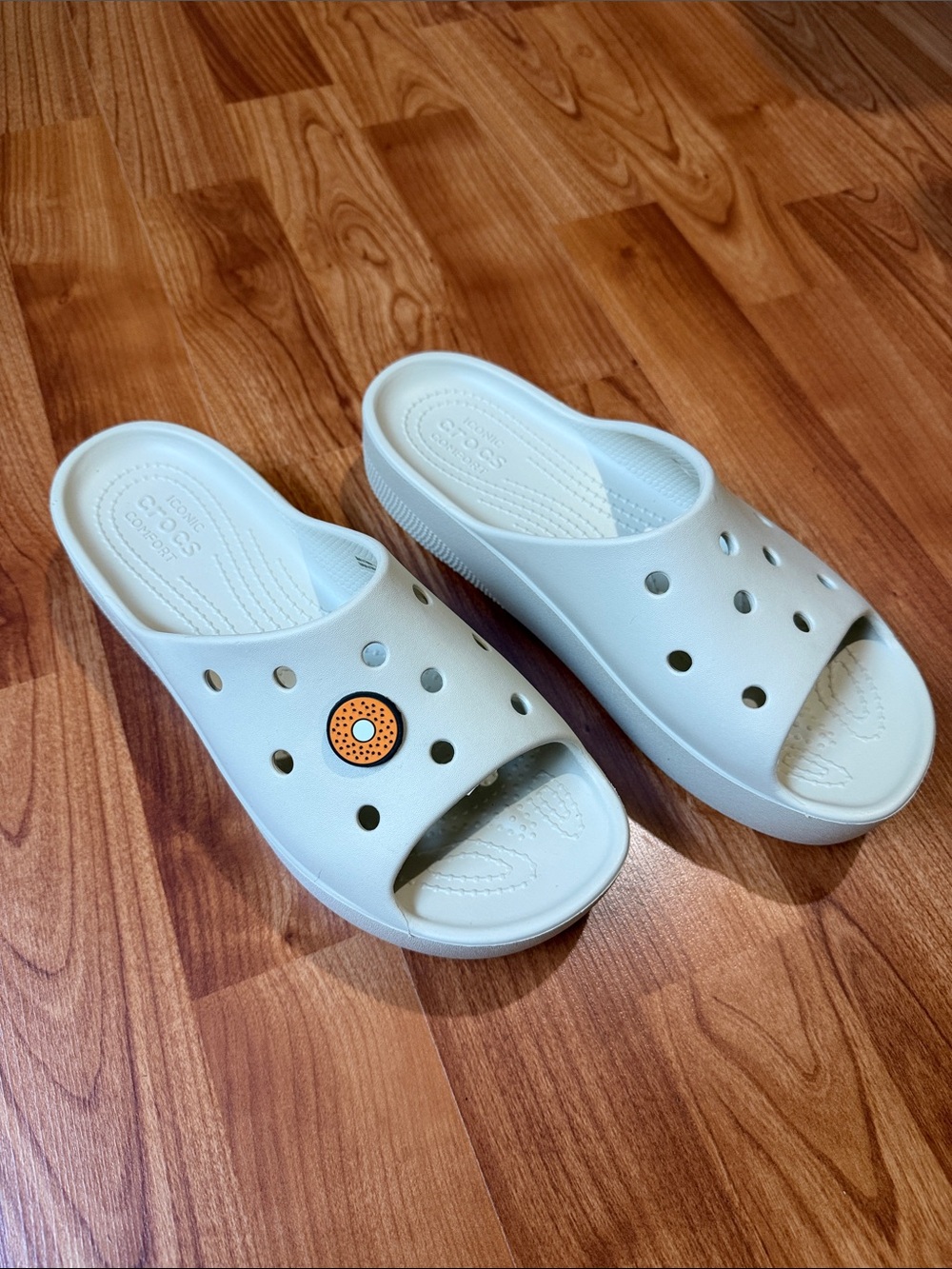 CROCS Women’s Slide Sandals in Cream with Bagel Charm